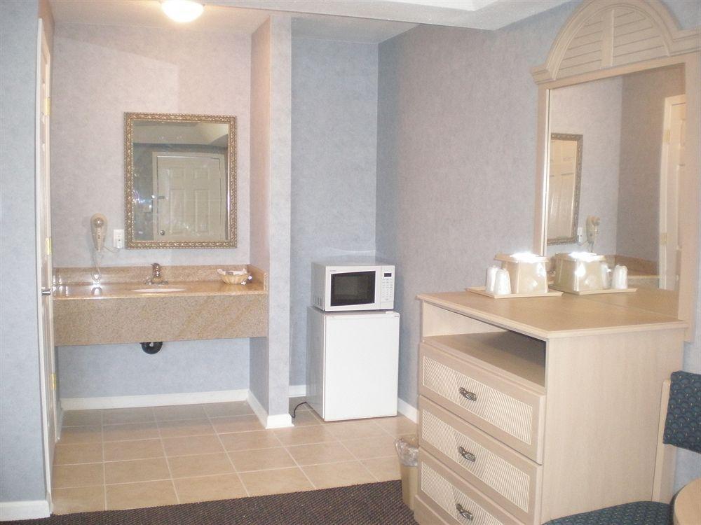 Village Inn & Suites - Smithville Phòng bức ảnh
