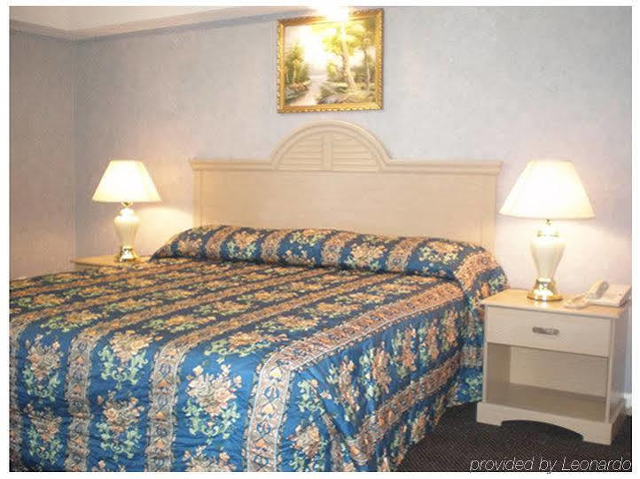 Village Inn & Suites - Smithville Phòng bức ảnh